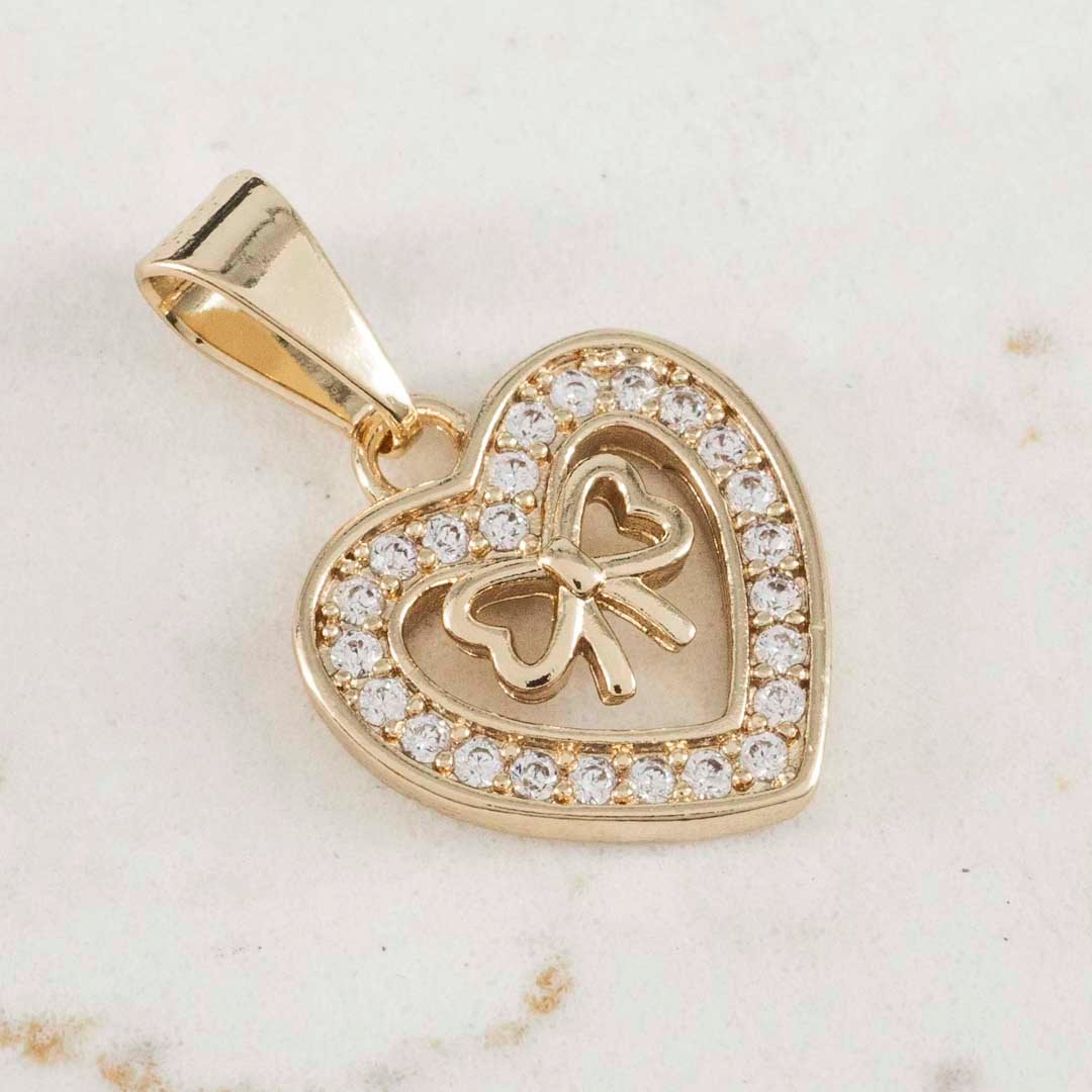DIJE CORAZON MOÑO EN MEDIO CIRCONES DIJE CORAZON MOÑO EN MEDIO CIRCONES